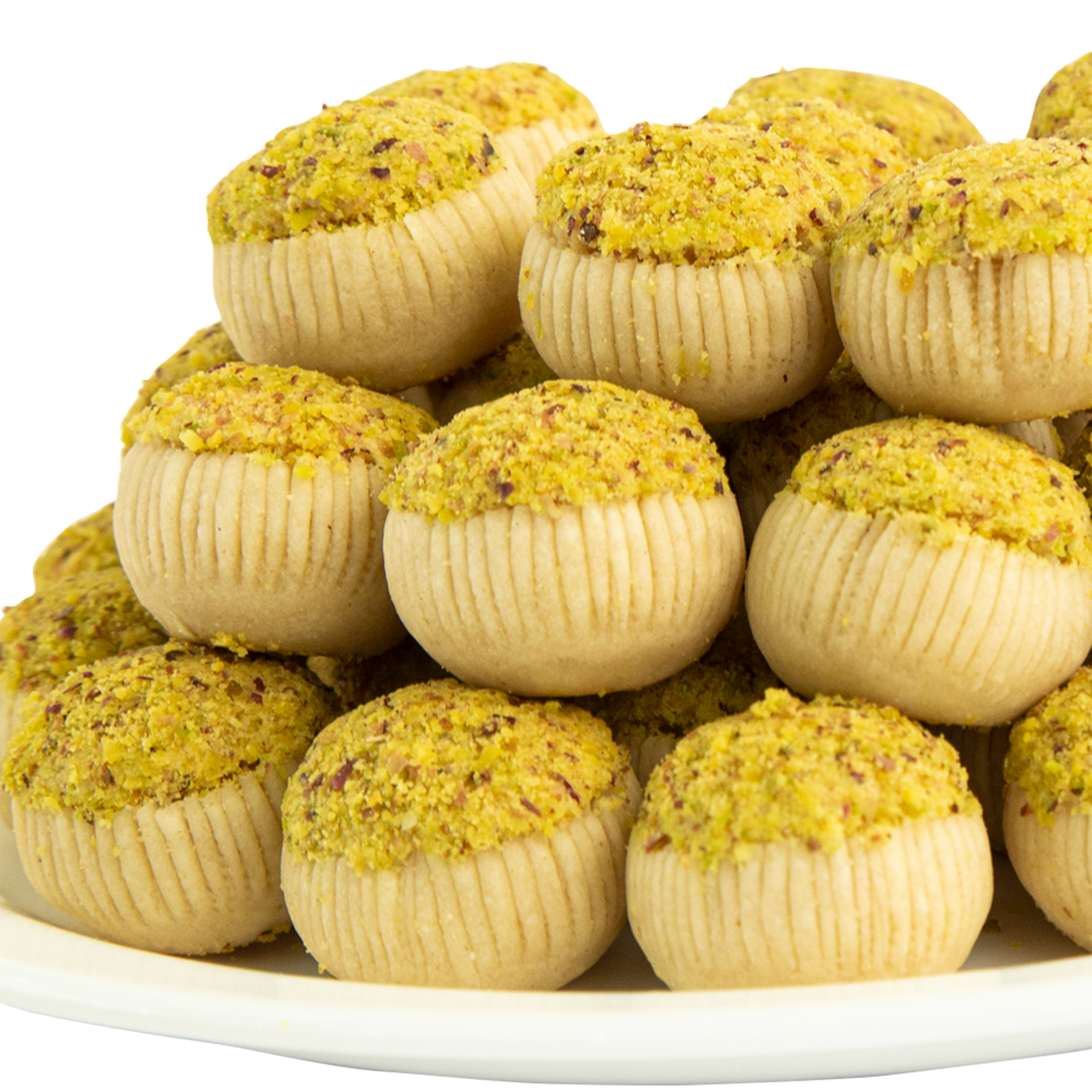 Tunisian almond tajin dessert cut into small squares by Masmoudi Gourmet